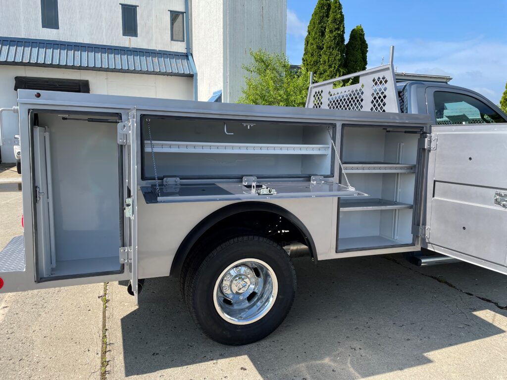 open cabinets on a custom truck body